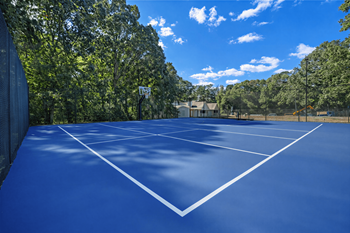 Newly renovated sports court with basketball, pickleball and tennis